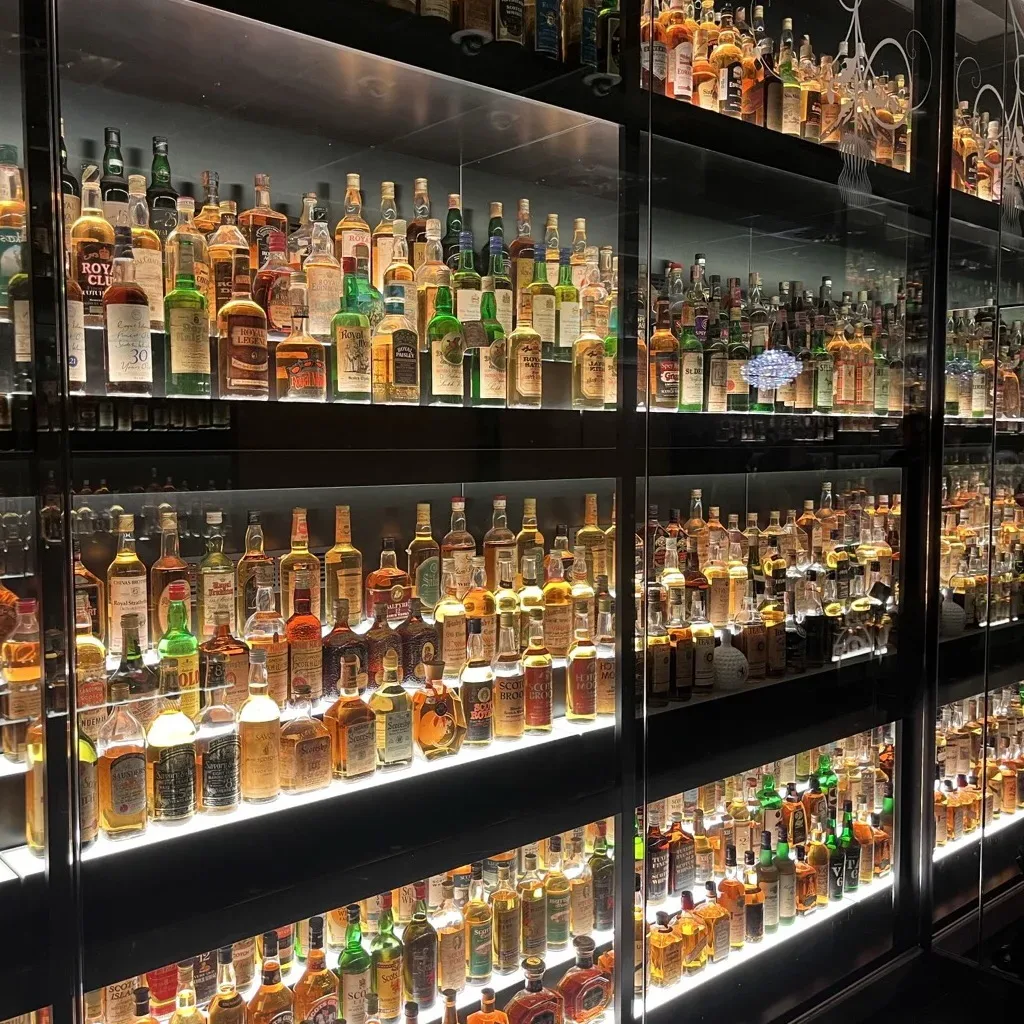 The illuminated cabinets of the Claive Vidiz Collection at the Scotch Whisky Experience in Edinburgh